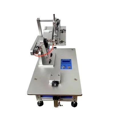 TM7001 Auto Feeding Garments Tagging Machine T Shirts Labeling Machines Tag Machine