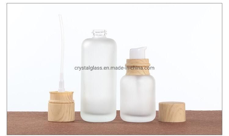 150ml Customized Logo Cosmetic Bottle in Frosted Glass with Wooden Caps in Store