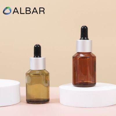 Light Gold Screw Pump Serum Glass Bottles in Round Shape for Body and Face Care