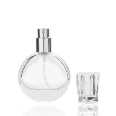 China Manufacturer 25ml Custom Fancy Luxury Glass Perfume Bottles Round Perfume Bottle with Cap Fragrance Bottle