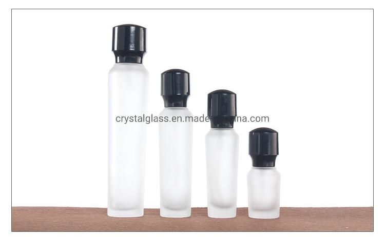 China Wholesale Empty Lotion Bottle with Pump in Frosted Glass with Black Caps