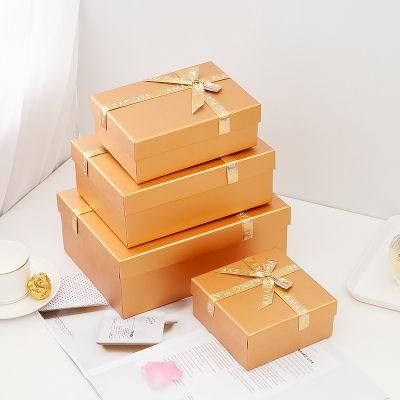 Wholsale Customized Logo Ivory Paper 350g with Matte Laminate Ribbon Hand Bag Gift Box Set