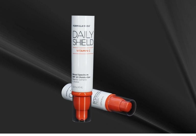 Cosmetic Packaging Hot Sale White Plastic Laminated Sunscreen Lotion Tube with Orange Pump