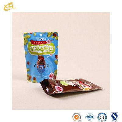 Xiaohuli Package China Transparent Standing Pouch Manufacturer Bag with Valve Plastic Food Bag for Snack Packaging