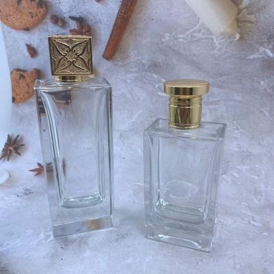 ODM 100ml Gold Stamping Logo Cosmetic Spray Packaging Clear Perfume Glass Bottle