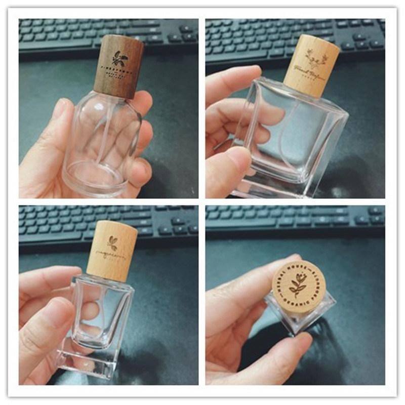 Custom Logo 30ml 50ml Glass Spray Bottle Crimping Neck Perfume Bottle with Wooden Cap