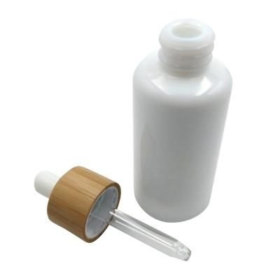 10%off Hot Sale 30ml Matte Transparent Essential Oil Glass Bottle with Bamboo Dropper Cap