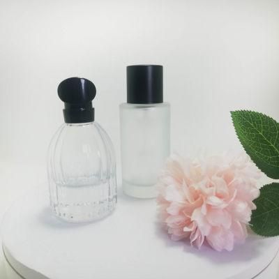 New Logo Printing Wholesale Perfume Glass Clear Spray Bottle Cosmetic Packaging