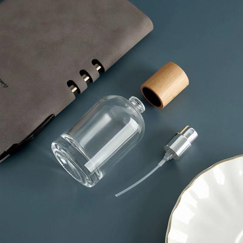 Custom Logo 30ml/50ml Luxury Cylinder Glass Thick Bottom Spray Empty Perfume Bottle with Wooden Cap Travel Cosmetic Container