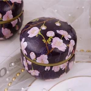 a Tin Box with Peach Blossom Design