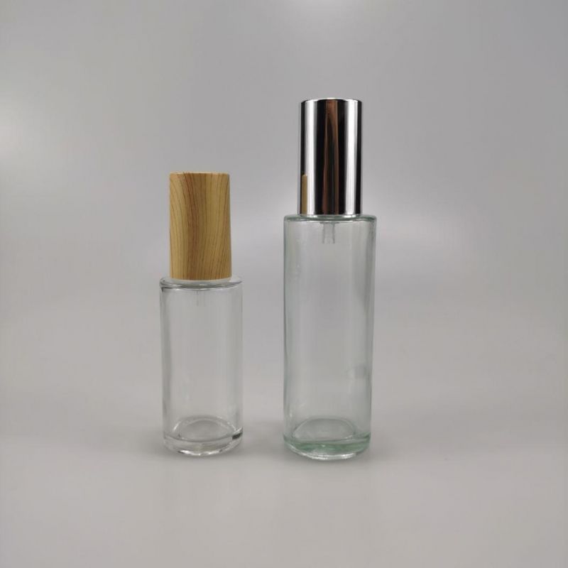 30ml 40ml 50ml 80ml 100ml 120ml Press Spray Pump Glass Bottle Lotion Bottle with Wood Grain Cap and Silver Cap