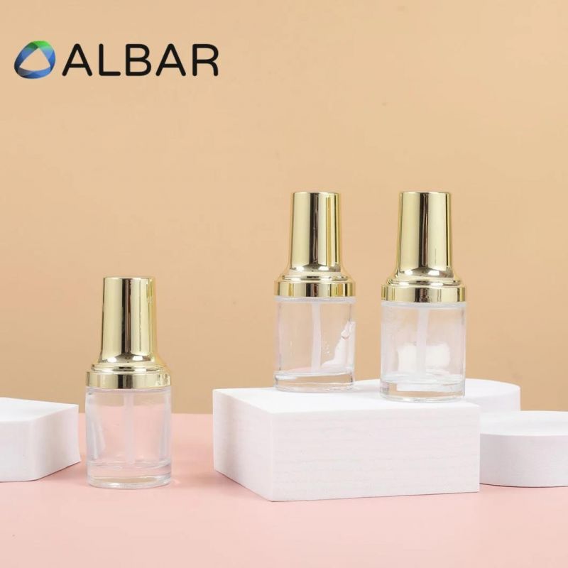 Thick Base Light Gold Fluid Pump Flat Shoulder Short Cylinder Cosmetic Glass Bottles