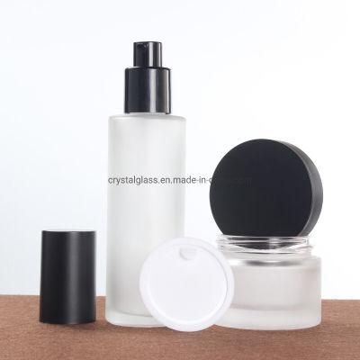 China Supply 80ml Lotion Glass Bottle with Black Caps