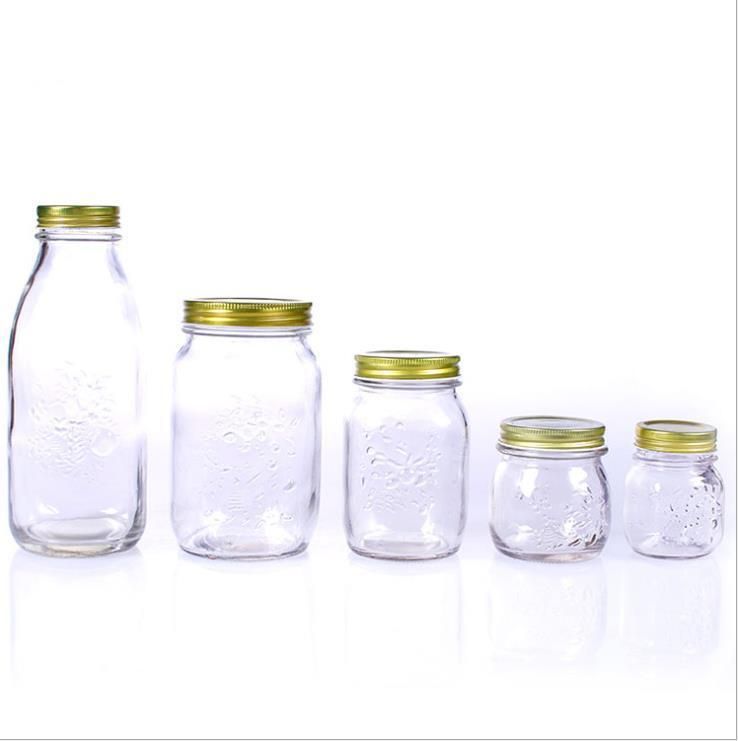 150ml 300ml 500ml 1000ml Round Shape Clear Carved Storage Glass Mason Jar with Gold Color Screw Lid