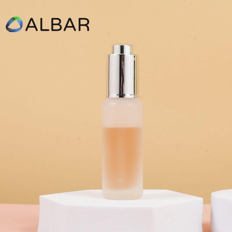 Silver or Customized Gold Pump Dropper Cosmetics Glass Bottles for Serum Emulsion