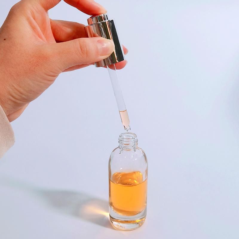 Wholesale Push Button Skincare Serum Face Essential Oil Essence Glass Dropper Bottle 15ml 30ml
