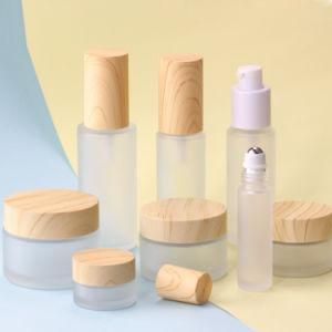 20/30/40/50/60/80/100/120ml Glass Lotion Bottle Customized Pump Frosted Emulsion Liquid Bottle with Wood Color Cap