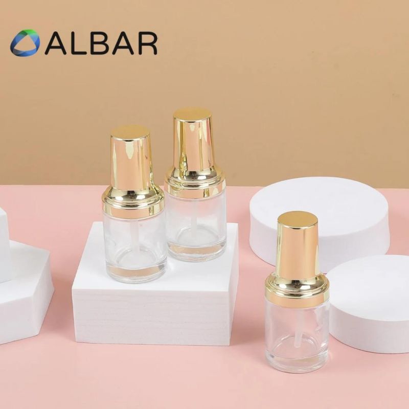 Thick Base Light Gold Fluid Pump Flat Shoulder Short Cylinder Cosmetic Glass Bottles