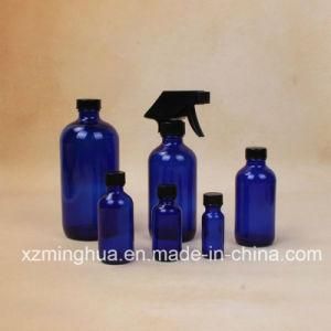 1oz, 2oz, 4oz, 8oz, 16oz Clear, Blue Boston Round Bottle with Trigger Spray