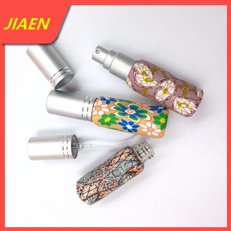 Wholesale China Style Empty Colorful 8ml Flint Glass Bottle Round Refillable Perfume Bottle Clay Painting Cosmetic Bottle with Spray Atomizer Cosmetic Packaging