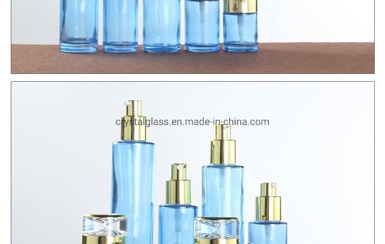 Blue Luxury Cosmetic Glass Bottle Set with Gold Caps