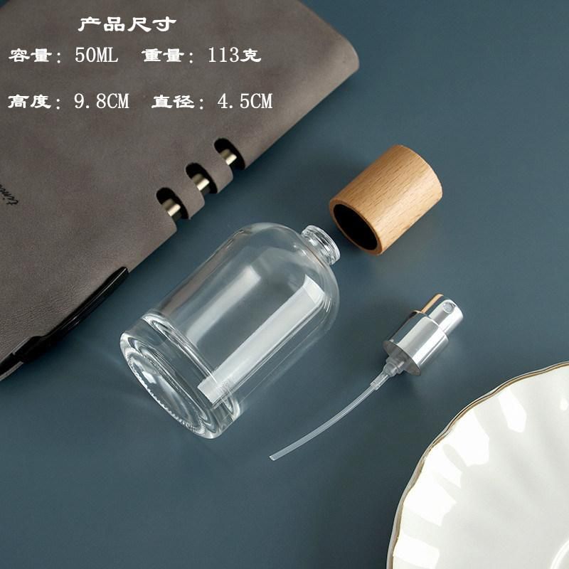 100ml 50ml 30ml Thick Clear Glass Essential Oil Bottle with Wood Lid for Perfume Aromatherapy Portable Square Refillable Bottle Custom Design