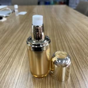 Factory Customized 30ml Round Luxury Golden Lotion Liquid Foundation Glass Pump Bottle