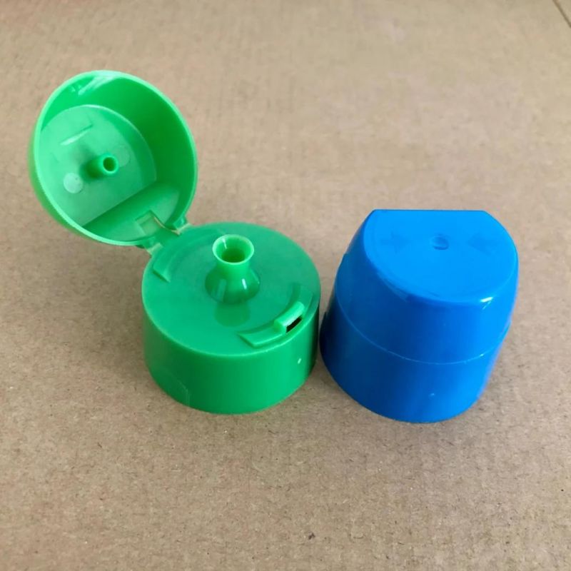 New Developped Flip Top Cap with 2 Kinds of Different Closure and with Squeezing From Both Sides Opening Manner