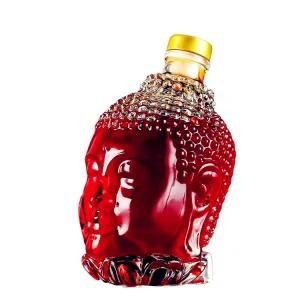 China Wholesale Factory Price 750ml Buddha Head Shape Glass Wine Bottles