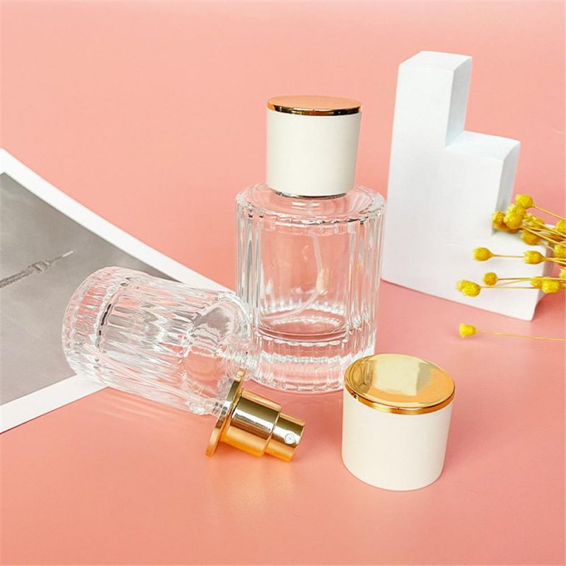 2022 New Design 30ml 50ml Luxury Glass Perfume Bottle Cylinder Shape Clear Spray Glass Screw Bottle