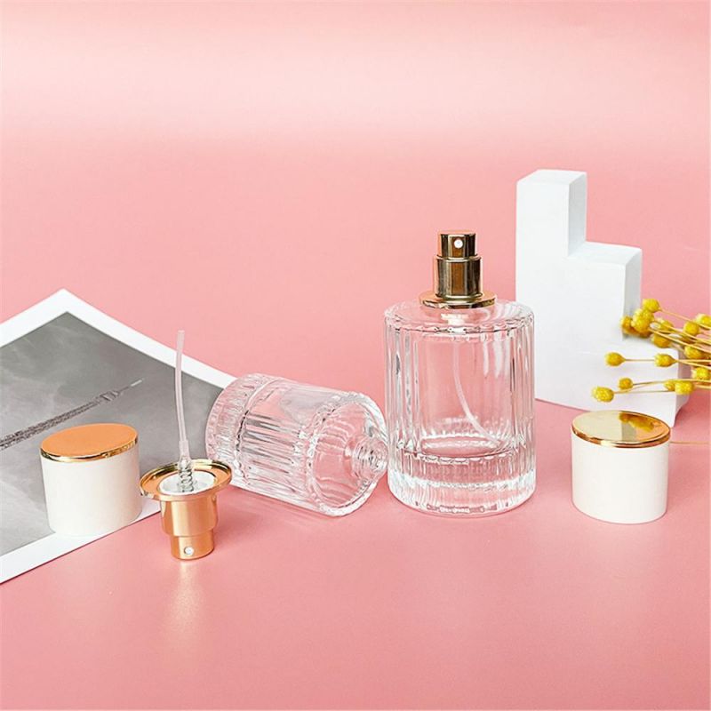 2022 New Design 30ml 50ml Luxury Glass Perfume Bottle Cylinder Shape Clear Spray Glass Screw Bottle