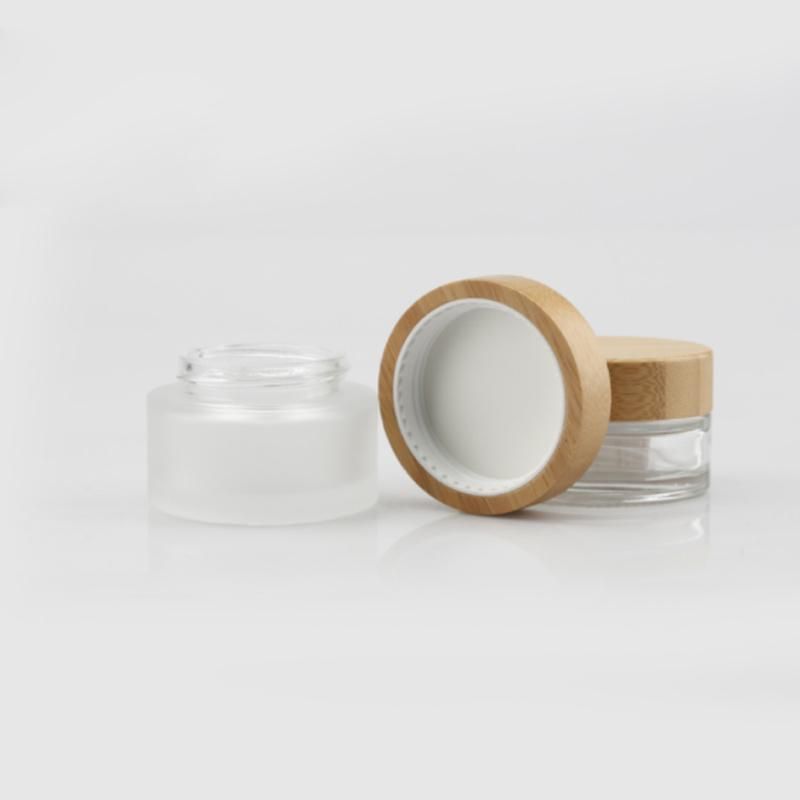 Eco Friendly Custom Logo Glass Cosmetic Jar 30g 50g Clear Frosted Glass Jars with Bamboo Wood Lid