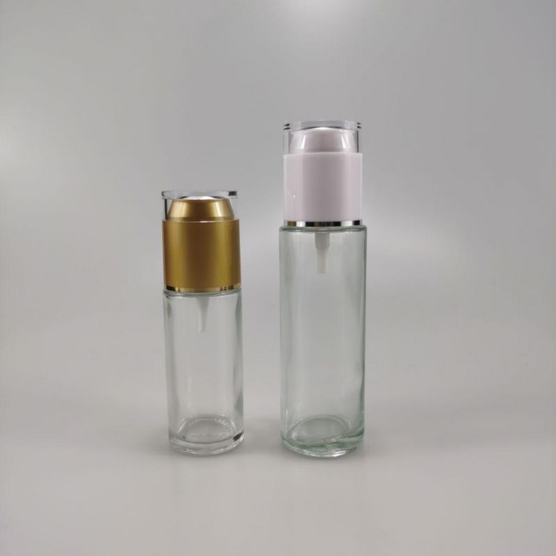 30ml 40ml 50ml 80ml 100ml 120ml Transparent Frosted Cylinder Glass Serum Lotion Bottle with Gold Silver Treatment Pump