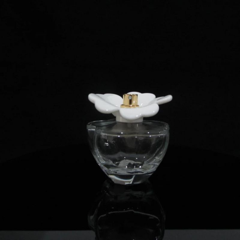 Women′s Empty Wholesale Flower Glass Perfume Bottle 100 Ml