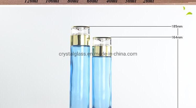 Blue Luxury Cosmetic Glass Bottle Set with Gold Caps