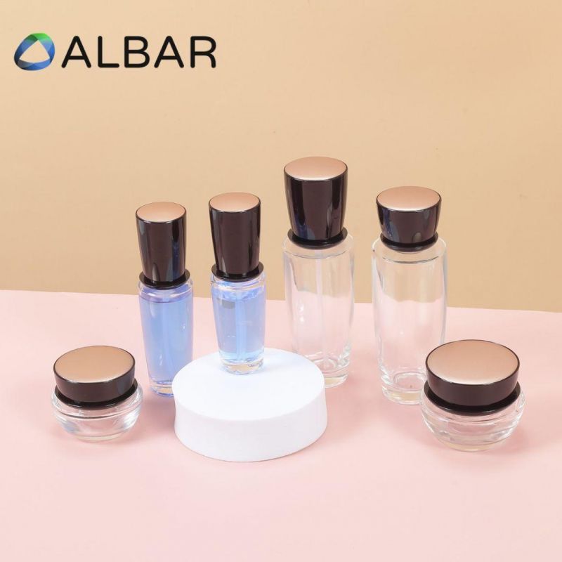 Clear Slim Oval Glass Bottles for Cosmetics Skin Care with Liquid Pump in Black Caps