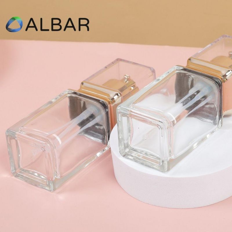 Clear and Gold Cover Rectangle Cosmetic Glass Bottles with Customized Printing Logo