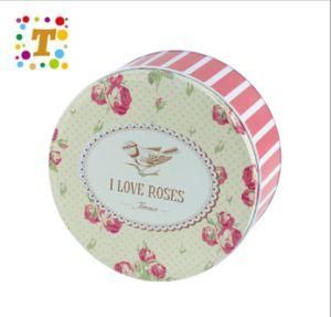 a Tin Box for Cookies with a Rose Pattern