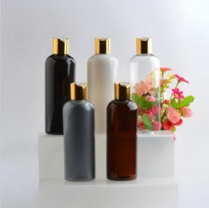 300ml Pet Plastic Round Shoulder Cosmetic Lotion Spray Shampoo Bottle with Alumite Gold and Silver Press Cap