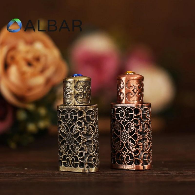 Hollow Zinc Attar Oud Metal Bottles Mini Glass Bottles with Curve Decorations