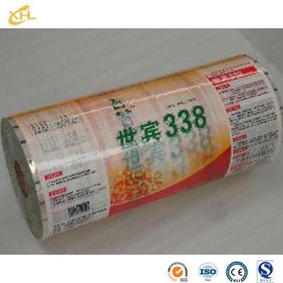 Xiaohuli Package China Eco Friendly Drink Packaging Manufacturer Stand up Pouch 3 Side Seal Candy Packaging Roll for Candy Food Packaging