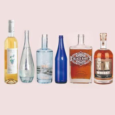 Customized Design OEM ODM Blue Empty Customized Round Shape Vodka 1200ml Gin Clear Whisky Rum Vodka Brandy Glass Bottles