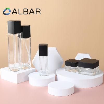 High Quality Cosmetics Square Set Glass Bottles with Black Caps and Press Pumps