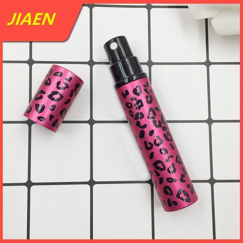 China Wholesale Empty Leopard Print 8ml Flint Glass Bottle Round Shape Refillable Perfume Bottle with Spray Atomizer