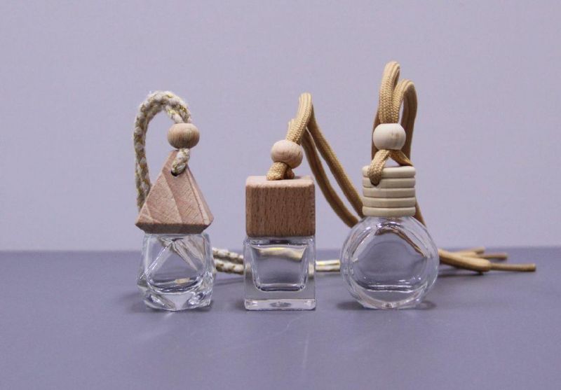 Low MOQ 5ml 6ml 7ml 8ml OEM Car Air Freshener Hanging Glass Perfume Wooden Cover Car Diffuser Bottle