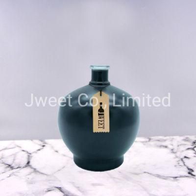 Factory Wholesale Brown Painting Dragon Emboss Round Liquor Glass Bottle