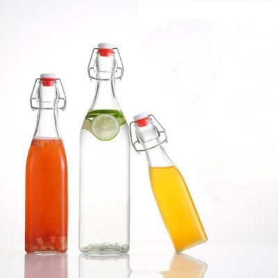 Wholesale 250ml 500ml 750ml 1000ml Round Clear Amber Glass Beer Bottle with Swing Top Cap