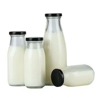 0.5L 1L Round Shape Glass Bottle for Packaging Milk