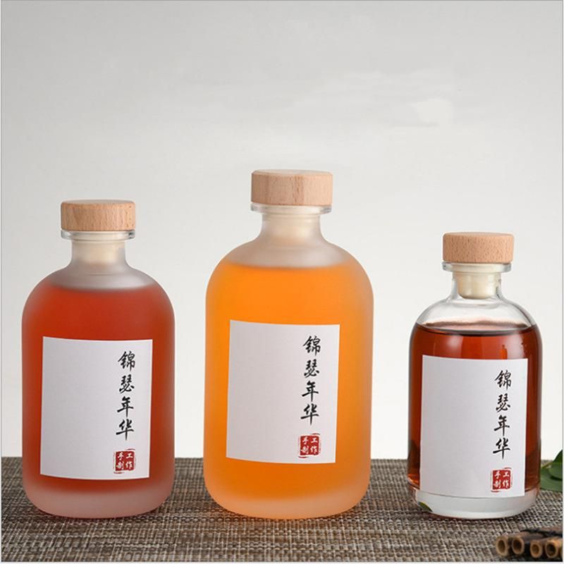 Wholesale Round Empty Vodka Beverage Juice 500ml Glass Bottle with Cork