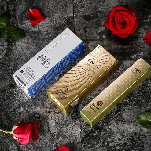 Wholesale Customized UV Color Printing Loge Cosmetic Perfume Lipstick Mask Cream Packaging ODM Single Laser Bronzing Matte Gold Cardboard Folding Box